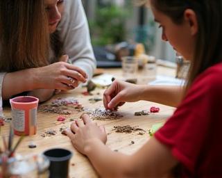 People participating in a crafting workshop